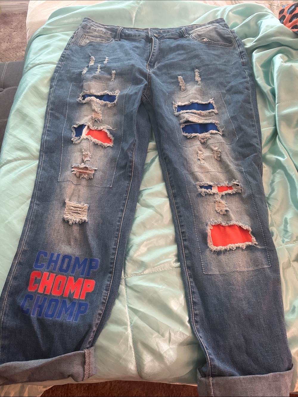 Women’s Blue Distressed Jeans with Orange & Blue Patch Details